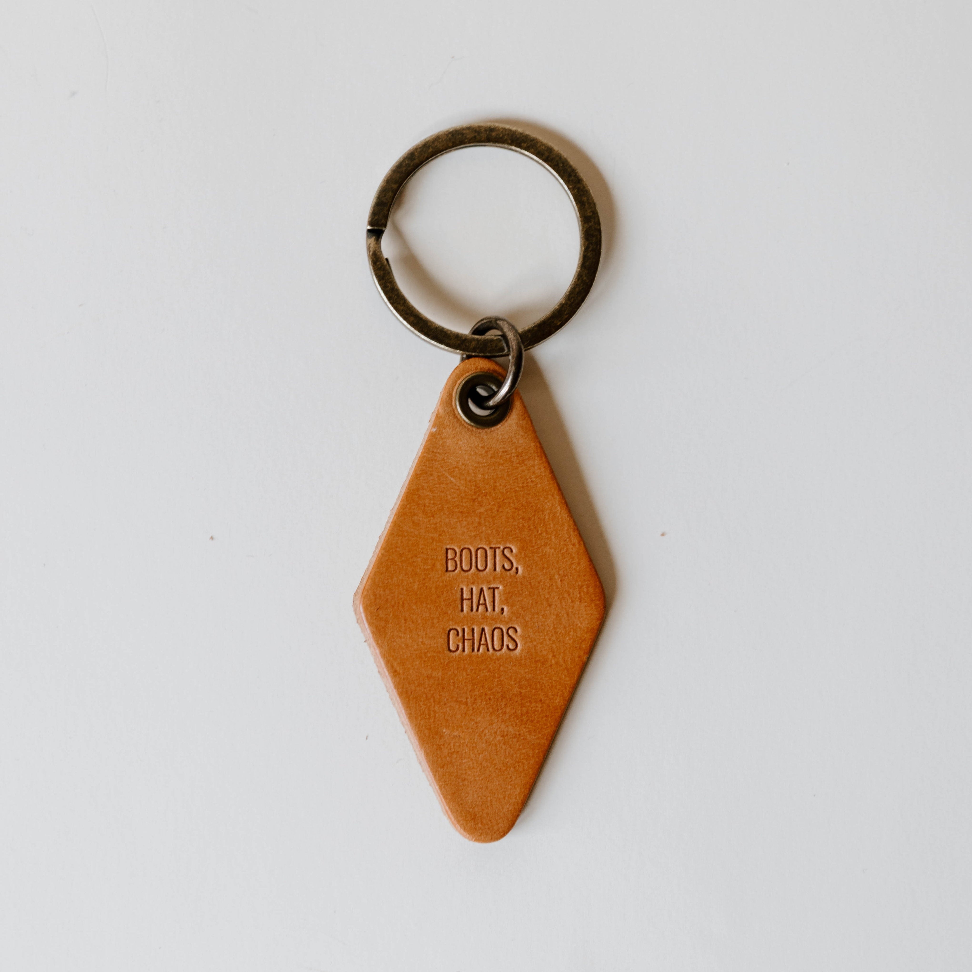 Hotel Keychain | Boots, Hat, Chaos